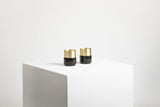 BLACK MARBLE BRASS CANDLE HOLDERS - THE WILD SHOWCASE