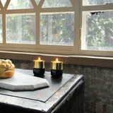 BLACK MARBLE BRASS CANDLE HOLDERS - THE WILD SHOWCASE